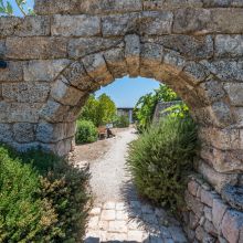 Rustic stone architecture and Mediterranean plants at a Salento retreat