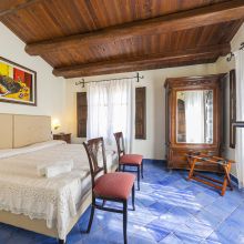 Traditional farmhouse room with rustic Sicilian furnishings