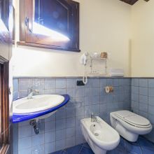 Bright bathroom with modern fixtures and Mediterranean style