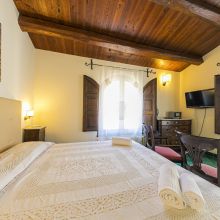 Welcoming guest bedroom with Mediterranean-inspired interiors