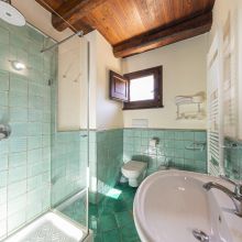 Bathroom with traditional Sicilian details and natural light