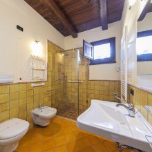 Tastefully furnished bathroom in a historic farmhouse near Cefalù