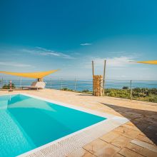 Infinity pool surrounded by nature near Cefalù