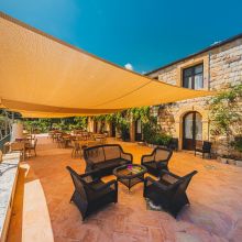 Traditional Sicilian farmhouse with stone walls and rustic details