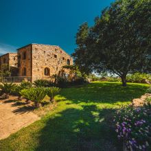 Traditional Sicilian farmhouse with stone walls and Mediterranean architecture