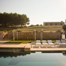 The view of the pool area, the perfect place to unwind and nourish the heart and soul Otranto Alimini a view of the pool area