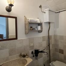A rural bathroom in a lamia Cisternino Trulli-a bathroom in a lamia