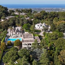 View of the property, the Authentic Charm of Puglia B&B Valle dei Trulli, nature, trulli, pool and the sea