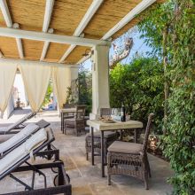 Outdoor seating area at a traditional country holiday house in Puglia
