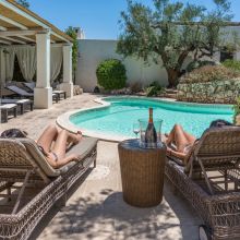 Pool surrounded by olive trees at a rural holiday retreat in Salento