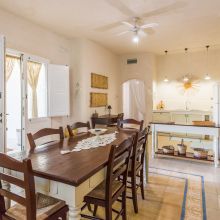 Dining area in a rustic country apartment, in Salento
