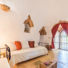 Stone walls and rustic furnishings in a traditional Salento country house