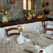 Traditional flavours in a timeless setting Restaurant tables set for dinner at a countryside agriturismo in eastern Sicily