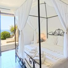 Double bedroom of an apartment, sweet dreams with a sea view Double bedroom in a holiday apartment at a sea view residence in Santa Maria al Bagno, Apulia