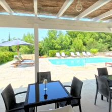 Slow afternoons beside the water Poolside relaxation area at a holiday residence near Gallipoli in southern Apulia