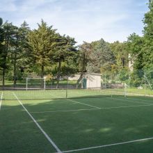 A tennis match among olive groves B&B Valle dei Trulli, the tennis court