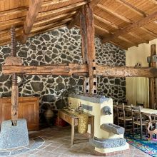Traditional stone wine press converted into a living area Traditional stone wine press converted into a living area at a rural B&B in Sicily