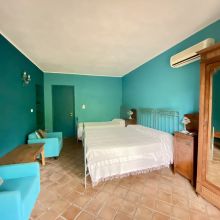 All rooms are simple and traditional B&B Etna trekking, example of double room in a simple Sicilian style