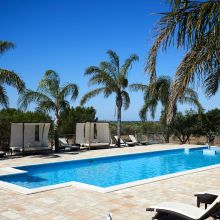 The art of letting a summer afternoon drift by Outdoor swimming pool at a historic masseria in Apulia