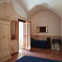Superior room, a restful pause between countryside and sea Interior of a superior room at a winery resort in Salento