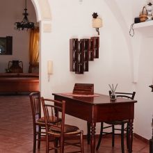 The common room, the warmth of traditional country living Traditional country house interior at a winery near the Apulian coast