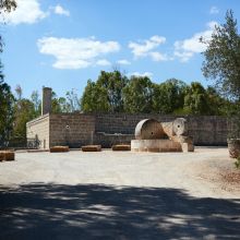 A sheltered courtyard made for unhurried mornings Inner courtyard of a traditional Apulian masseria with historic stone buildings