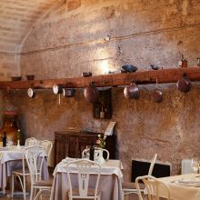 A countryside evening to look forward to Dining area prepared for guests at the rural restaurant of the masseria