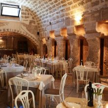 Rustic charm and the flavours of tradition Rustic restaurant interior at a traditional winery in southern Italy
