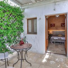 Veranda of a superior room, private time in the Apulian countryside Outdoor seating on the veranda of a superior room at the masseria Ostuni