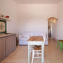 The Puglian kitchen of the 38 m2 1 bedroom apartment Otranto Alimini the kitchen and the living room of the 38 m2 1 bedroom apartment