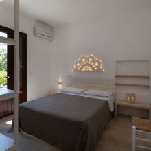 The bedroom of the 45 m2 1 bedroom apartment, Created to let you enjoy every moment, inside and out Otranto Alimini the bedroom of the 1 bedroom apartment 45 m2