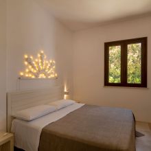 The bedroom of the 60 m2 2 bedroom apartment, styled in the authentic simplicity of Puglian tradition Otranto Alimini the bedroom of the 2 bedroom apartment 60m2