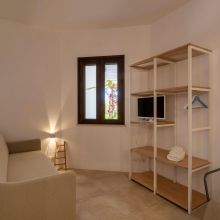The living room of the 60 m2 2 bedroom apartment, designed with simple Puglian style Otranto Alimini the living room of the 2 bedroom apartment 60m2