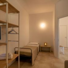 Second bedroom of the 60 m2 2 bedroom apartment, designed with simple Puglian style Otranto Alimini the second bedroom of the 2 bedroom apartment 60m2