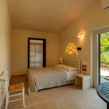 The bedroom of the 80 m2 2 bedroom apartment, simplicity and style Otranto Alimini the bedroom of the 2 bedroom apartment 80m2