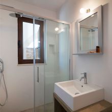 The bathroom of the double room, simple and functional Otranto Alimini the bathroom of the double room