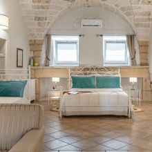 Elegant Junior Suite with traditional vaulted ceiling in a historic masseria