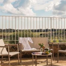 The terrace of a Suite, with a view on the Mediterranean countryside