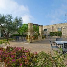 The courtyard of the masseria in typical, traditional Apulian style The courtyard of the masseria in typical, traditional Apulian style