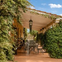 Outdoor restaurant at the winery Salento wine estate outdoor terrace