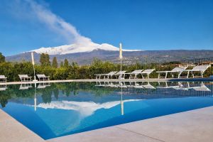 Beautiful pool with a view on the Mt. Etna and the sea Pool Etna view Organic Agriturismo Etna Garden