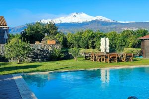 Traditional Sicilian agriturismo set among fragrant citrus orchards between Mount Etna and the Ionian Sea