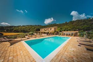 A charming farmhouse in the Sicilian countryside Historic stone farmhouse surrounded by lush greenery near Cefalù, Sicily